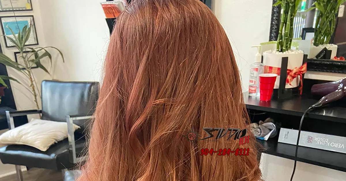This vibrant red head transformation from dark blond is a perfect change for any season of the year. Call Studio 101 at 304-284-8111 to make an appointment.